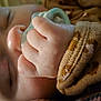 baby, sleeping, pacifier, hand, face, skin, clothing, brown, pattern, closeup, infant, peaceful, cute, soft, cozy, child, newborn, portrait, resting, fingers