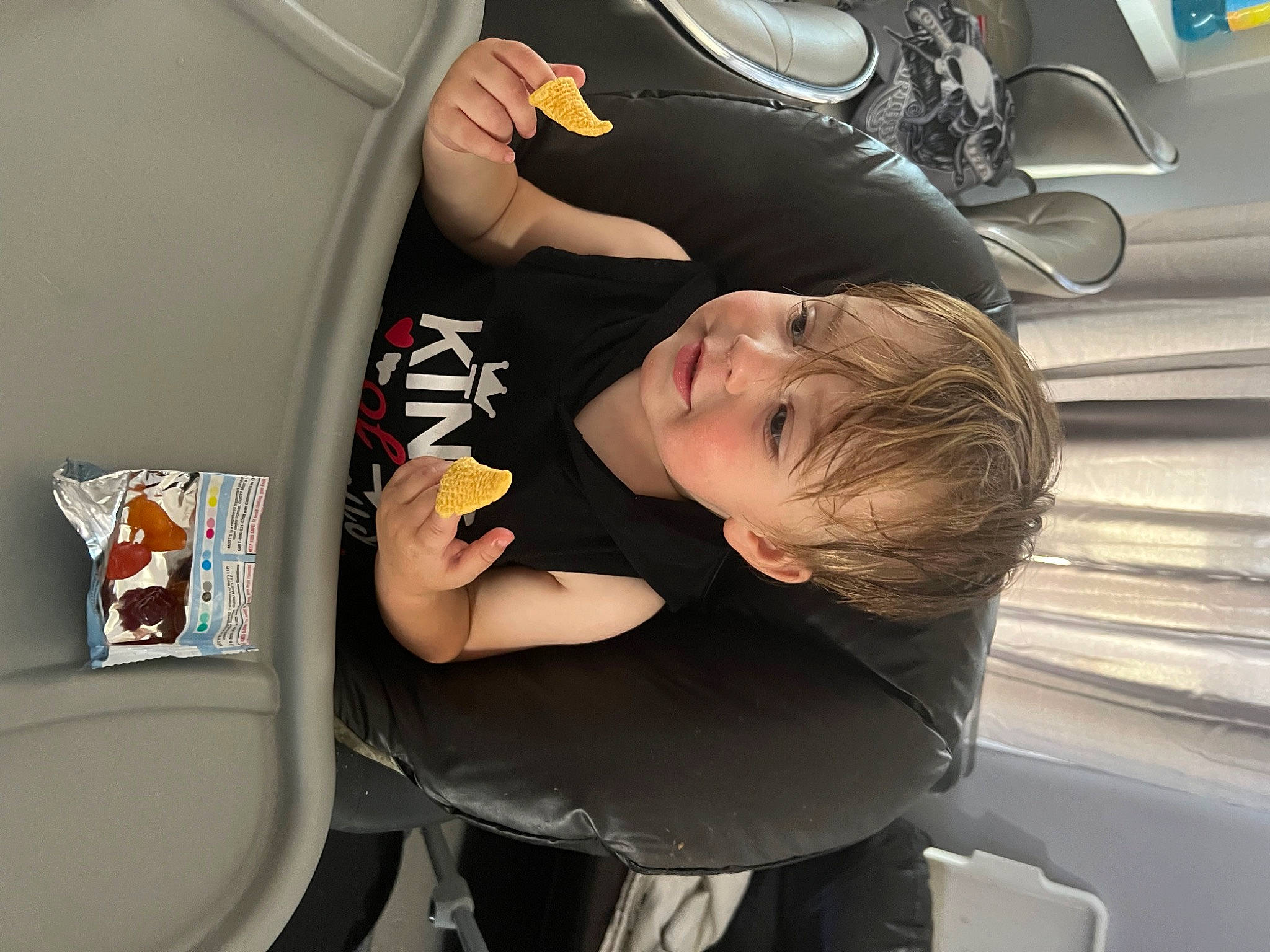 Levi is registered to the contest to win money with this photo: audio_equipment, auto_part, automotive_design, automotive_exterior, automotive_wheel_system, baby_products, car_seat, chair, child, comfort, family_car, fun, home_appliance, luxury_vehicle, mechanical_fan, motor_vehicle, person, sitting, t_shirt, toddler