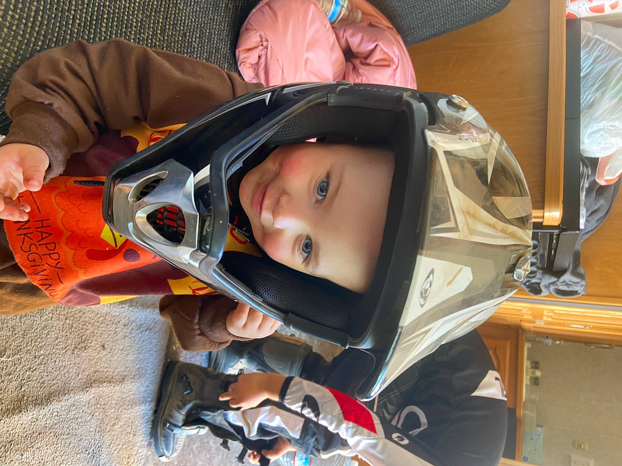 Levi joined the competition — help win amazing prizes! auto_part, baby, baby_carriage, baby_products, car_seat, carmine, child, comfort, costume, eye, fashion_accessory, fun, headwear, helmet, joy, motorcycle_helmet, person, personal_protective_equipment, room, sitting
