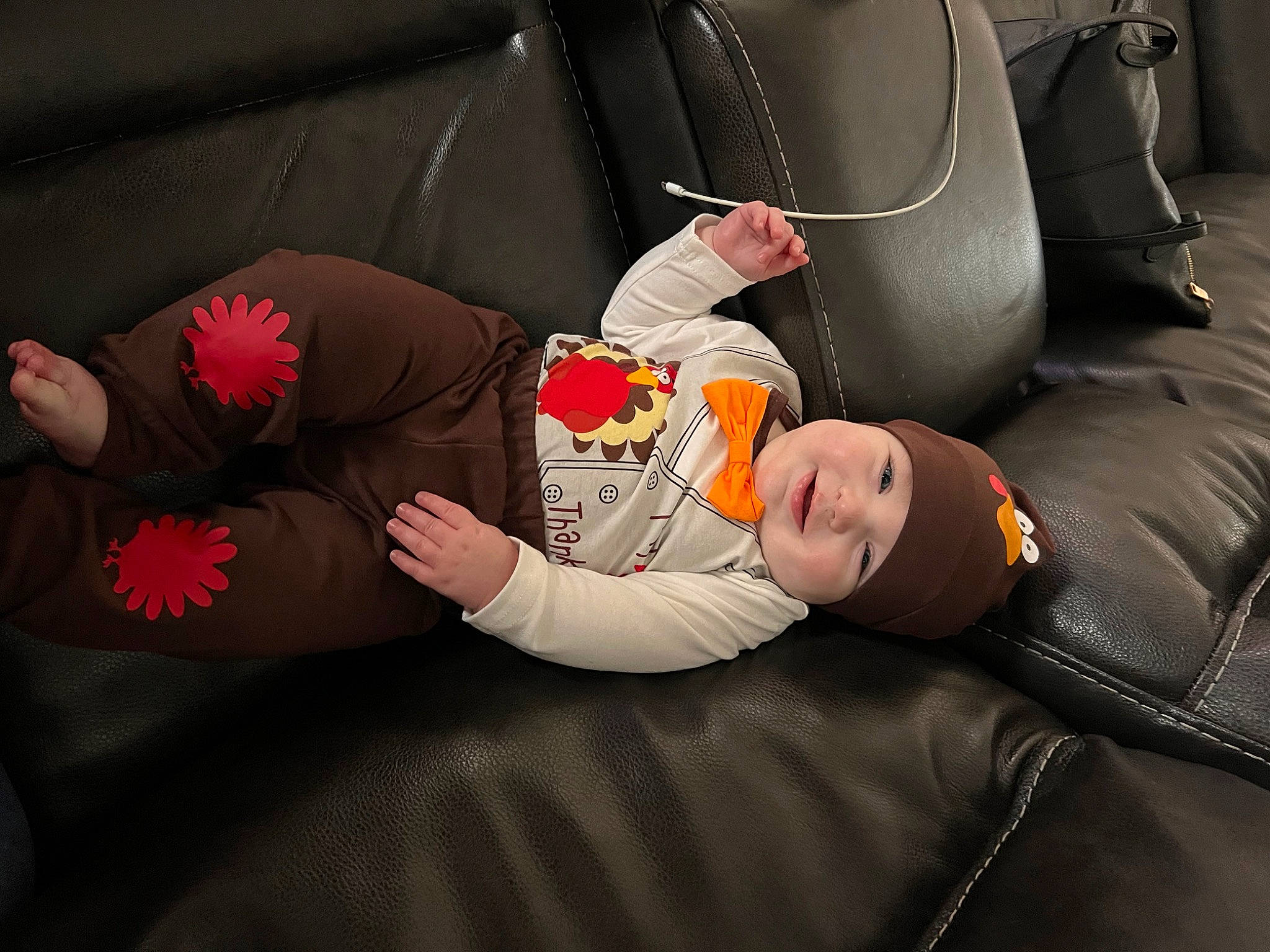 Dj is registered to the contest to win money with this photo: arm, auto_part, automotive_design, car_seat, carmine, comfort, couch, family_car, fun, hand, headwear, human_leg, joint, leg, luxury_vehicle, motor_vehicle, orange, person, sitting, steering_wheel