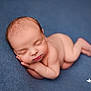 newborn, baby, sleeping, infant, blue_blanket, soft_texture, peaceful, cute, portrait, skin, face, hand, foot, closeup, rest, child, toddler, lying_down, calm, cozy