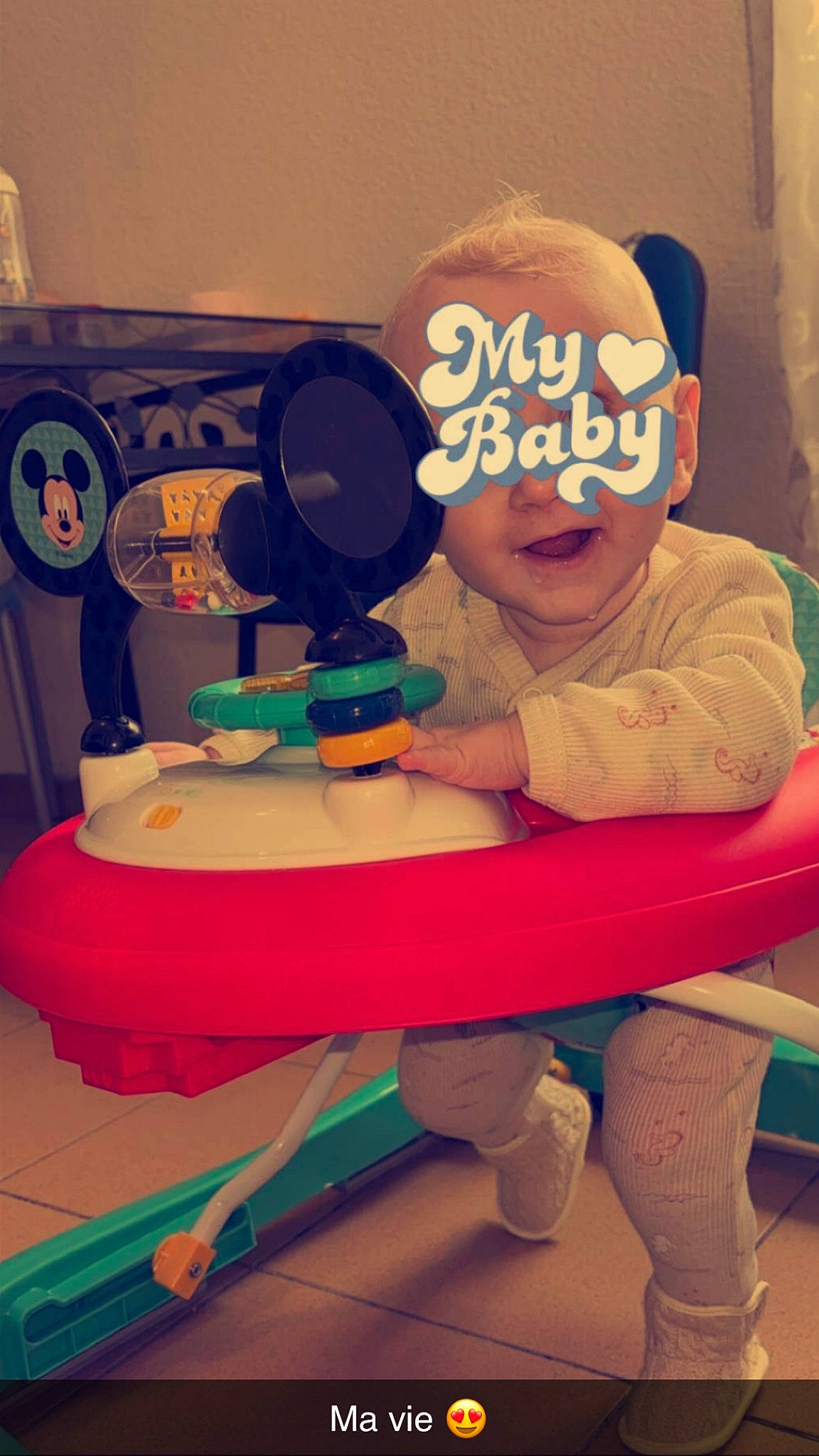 Evan participe au concours pour gagner de l'argent avec cette photo : animation, baby_toddler_clothing, baseball_cap, cap, child, flooring, fun, games, hairstyle, happy, hat, leisure, person, play, product, room, sitting, smile, sock, t_shirt