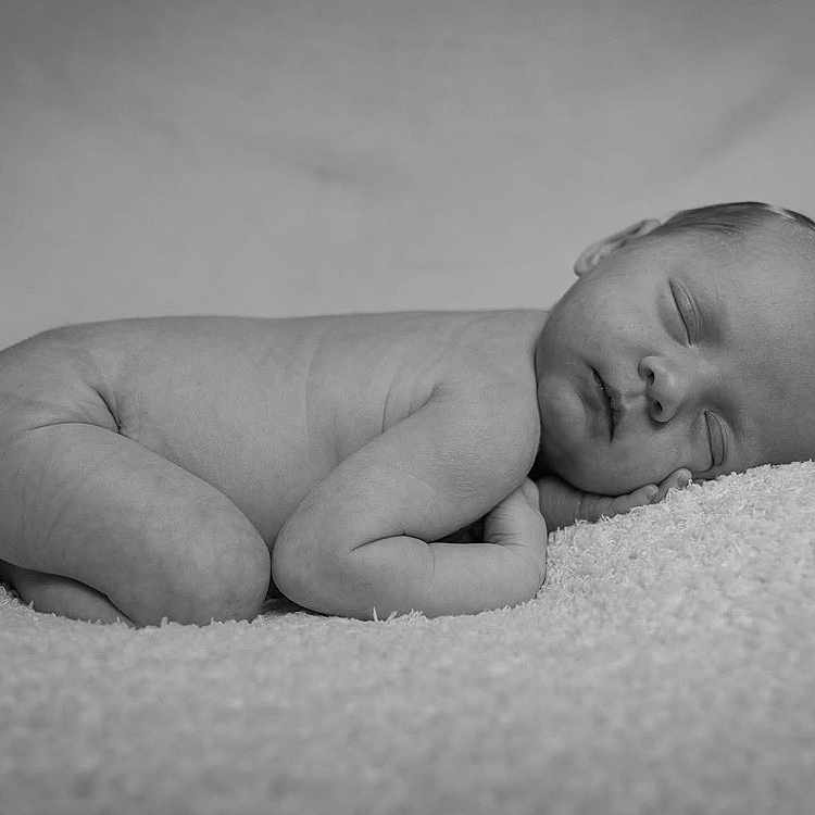 Eleanor joined the competition — help win amazing prizes! baby, black_and_white, blanket, child, cozy, cute, face, hand, head, infant, lying_down, newborn, peaceful, portrait, resting, skin, sleeping, soft, tender, young