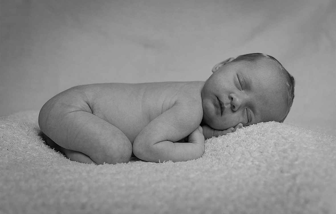 Eleanor joined the competition — help win amazing prizes! newborn, baby, sleeping, black_and_white, portrait, infant, soft, blanket, peaceful, cute, resting, child, skin, head, face, hand, lying_down, cozy, tender, young