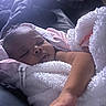Harmony is registered to the contest to win money with this photo: baby, sleeping, towel, blanket, infant, arm, face, cozy, soft_light, rest, peaceful, child, skin, indoors, portrait, newborn, comfort, relaxation, cute, wrapped
