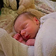 Kashdn joined the competition — help win amazing prizes! newborn, baby, sleeping, blanket, soft, plush, teddy_bear, cozy, bed, infant, peaceful, wrapped, cute, child, portrait, indoor, warm, resting, face, hand