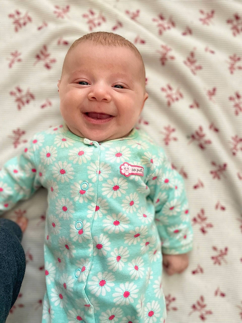 Charlene is registered to the contest to win money with this photo: baby, baby_products, baby_toddler_clothing, child, collar, comfort, face, happy, head, joy, laugh, linens, pattern, person, pink, skin, sleeve, smile, standing, t_shirt