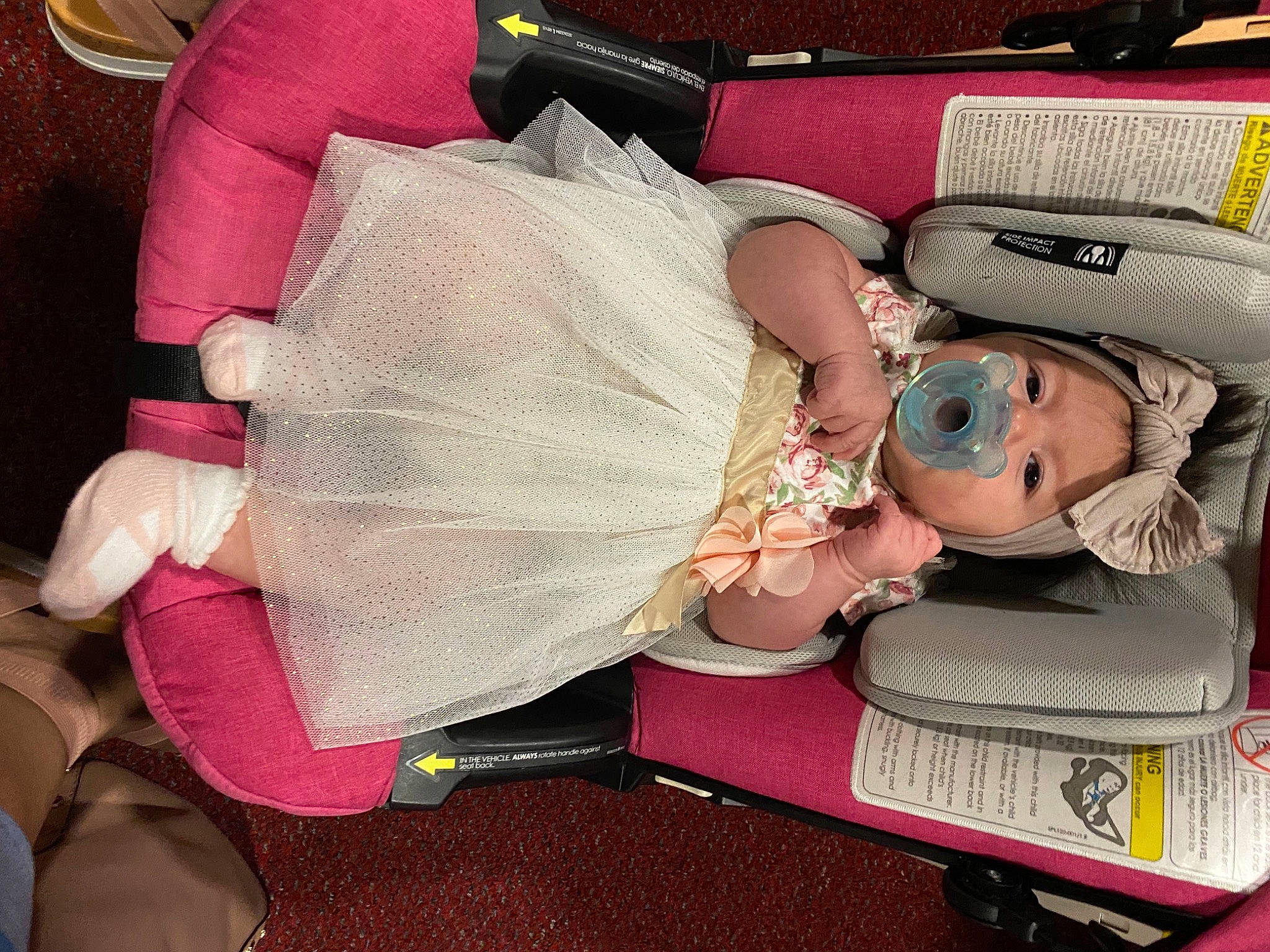 Kaylani Hadassah Mccormick is registered to the contest to win money with this photo: baby, baby_carriage, baby_products, baby_toddler_clothing, bag, baggage, car_seat, child, comfort, fashion_accessory, hat, human_leg, lap, luggage_and_bags, magenta, pattern, person, pink, sitting, thigh
