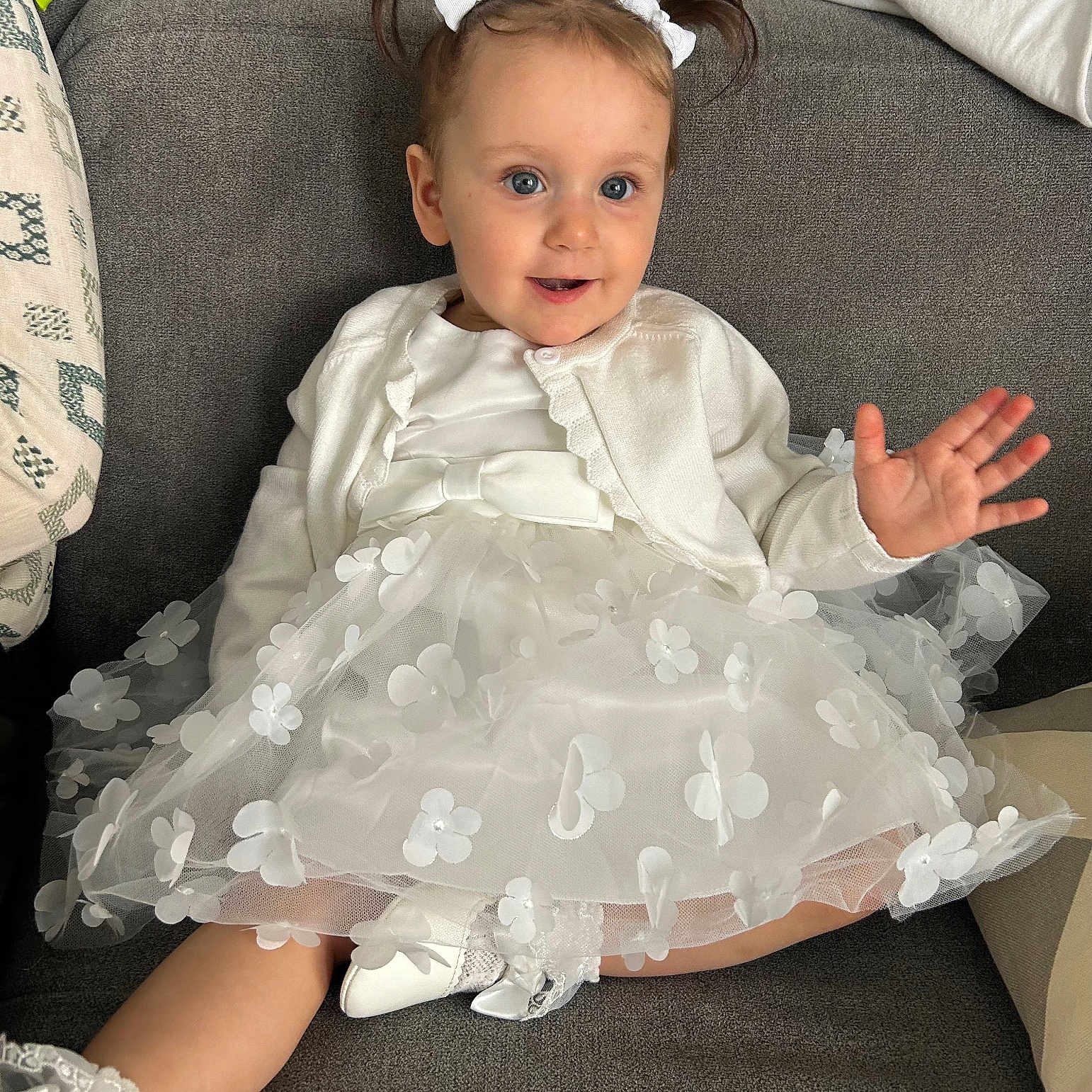 Eva participe au concours pour gagner de l'argent avec cette photo : baby, bodypart, chair, clothing, couch, cushion, dress, face, fashion, finger, formalwear, furniture, gown, hand, head, homedecor, person, photography, portrait, sitting