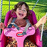 child, toddler, laughing, smiling, swing, playground, outdoor, park, grass, sunlight, portrait, happy, joyful, pink, safety_harness, ropes, leopard_print, leggings, little_tikes, playtime