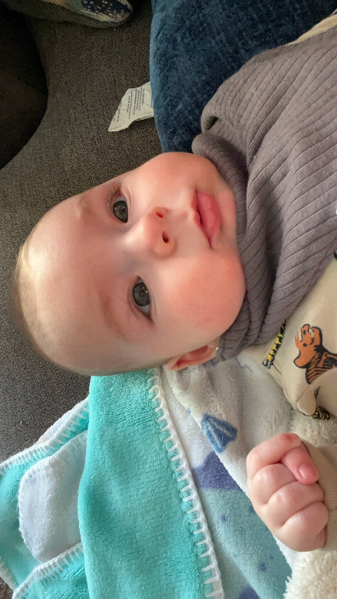 Bodie joined the competition — help win amazing prizes! baby, baby_toddler_clothing, blue, cheek, chin, close_up, eyebrow, eyelash, facial_expression, gesture, hat, iris, lip, mouth, neck, nose, person, skin, sleeve, thumb