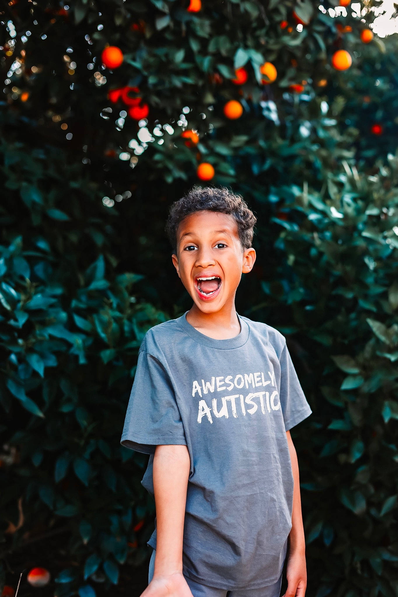 Julian is registered to the contest to win money with this photo: beauty, cool, facial_expression, flash_photography, fun, grass, hair, hairstyle, happy, human, leisure, people, people_in_nature, person, plant, sleeve, smile, standing, summer, surprise