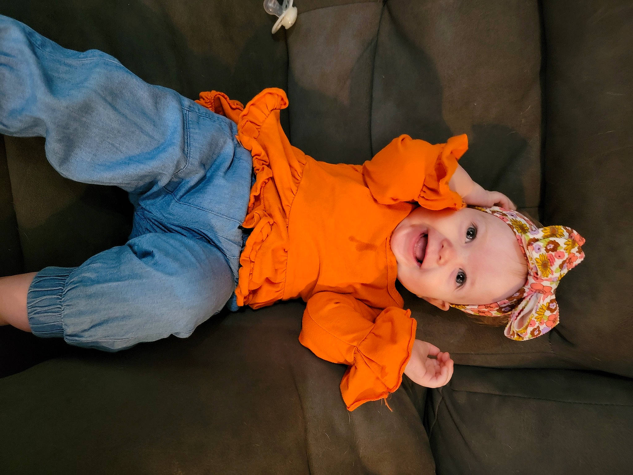 Elliza joined the competition — help win amazing prizes! baby, baby_products, baby_toddler_clothing, child, comfort, fun, happy, hat, headwear, human_body, joy, lap, orange, person, sitting, smile, toddler, tree, wood