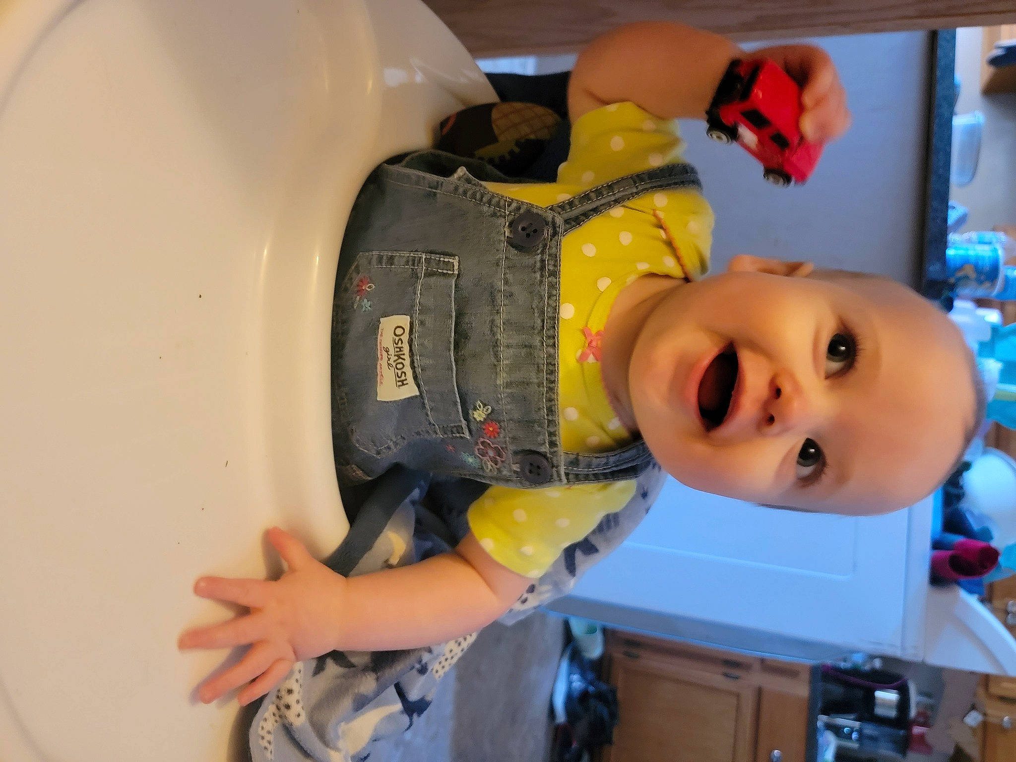 Elliza is registered to the contest to win money with this photo: baby, baby_products, baby_toys, cabinetry, child, drawer, fun, machine, person, personal_protective_equipment, plastic, play, room, smile, toddler, toy