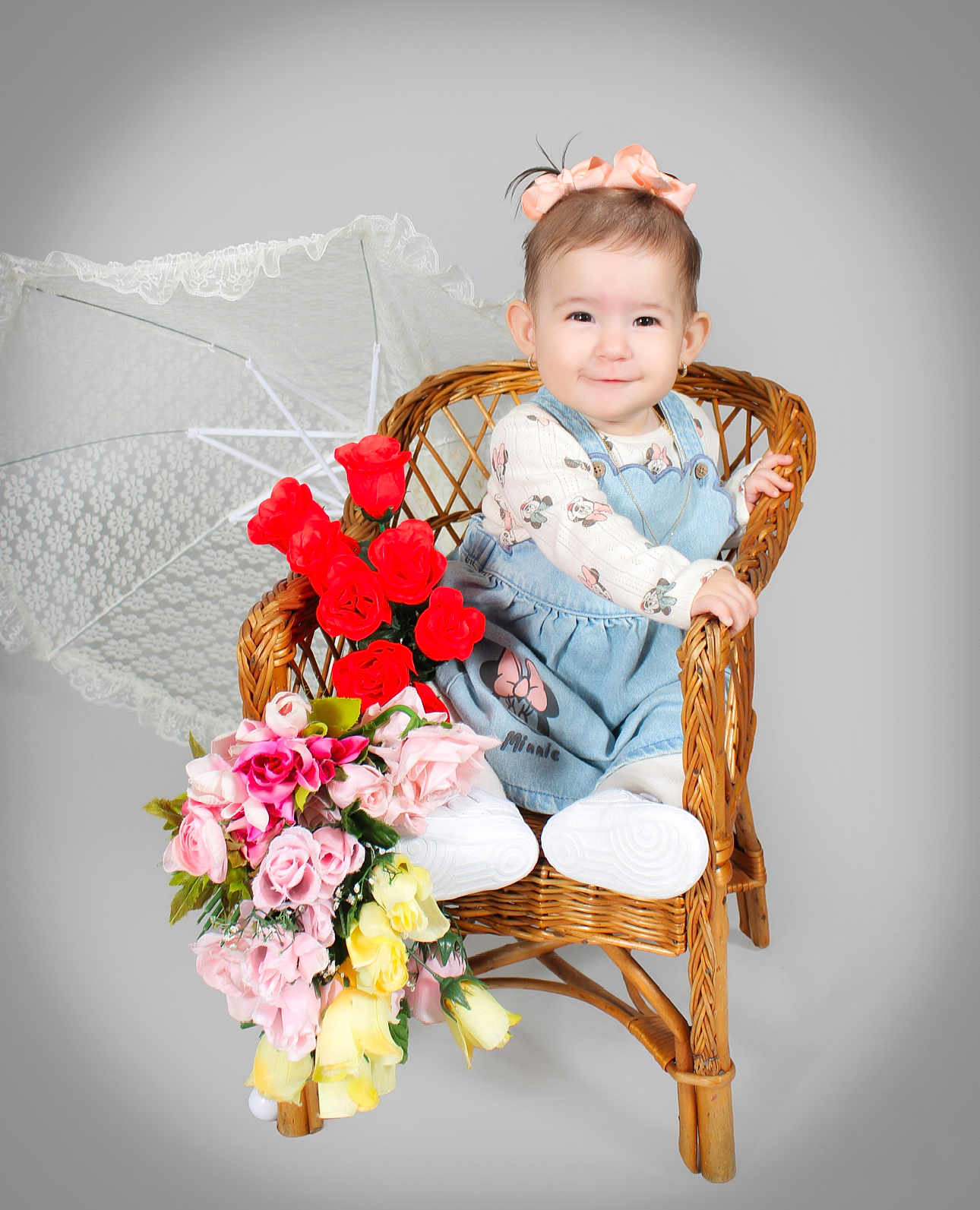 Sofia is registered to the contest to win money with this photo: baby, child, wicker_chair, flowers, bouquet, umbrella, bow, smile, dress, denim, long_sleeve, white_shoes, studio, portrait, cute, indoor, happy, flower_arrangement, accessory, pose