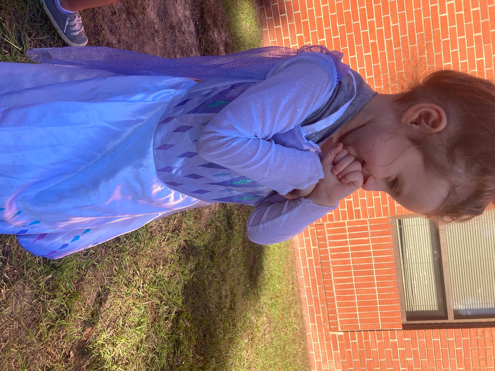 Harper is registered to the contest to win money with this photo: child, electric_blue, fun, grass, happy, leisure, light, line, people_in_nature, person, plant, shadow, smile, soil, tints_and_shades, toddler, water, window