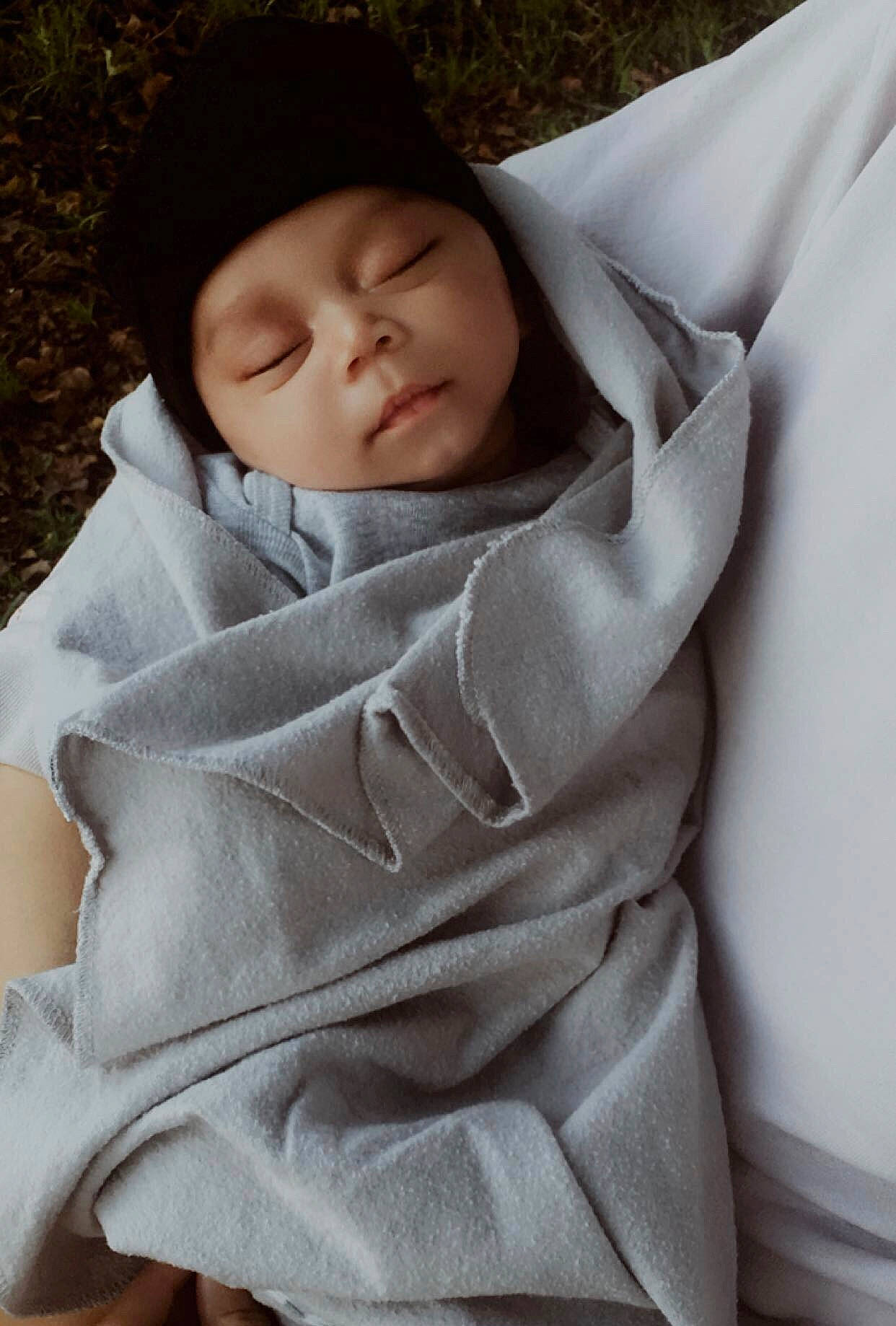 Zakhari is registered to the contest to win money with this photo: baby, baby_toddler_clothing, blanket, cheek, child, comfort, headwear, hood, hoodie, lip, person, skin, toddler
