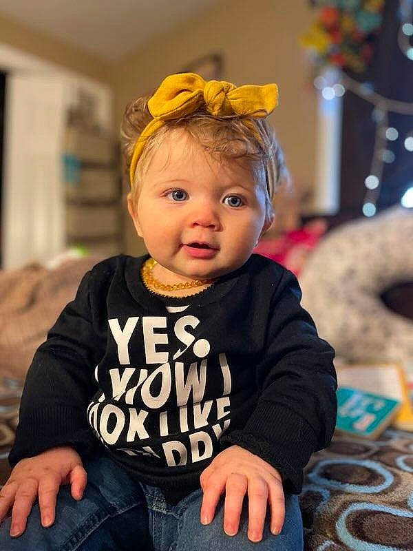 Aviana is registered to the contest to win money with this photo: baby, baby_toddler_clothing, cheek, child, clothing, denim, event, eye, fashion_accessory, fun, happy, headband, headpiece, iris, jeans, person, sitting, skin, sleeve, toddler