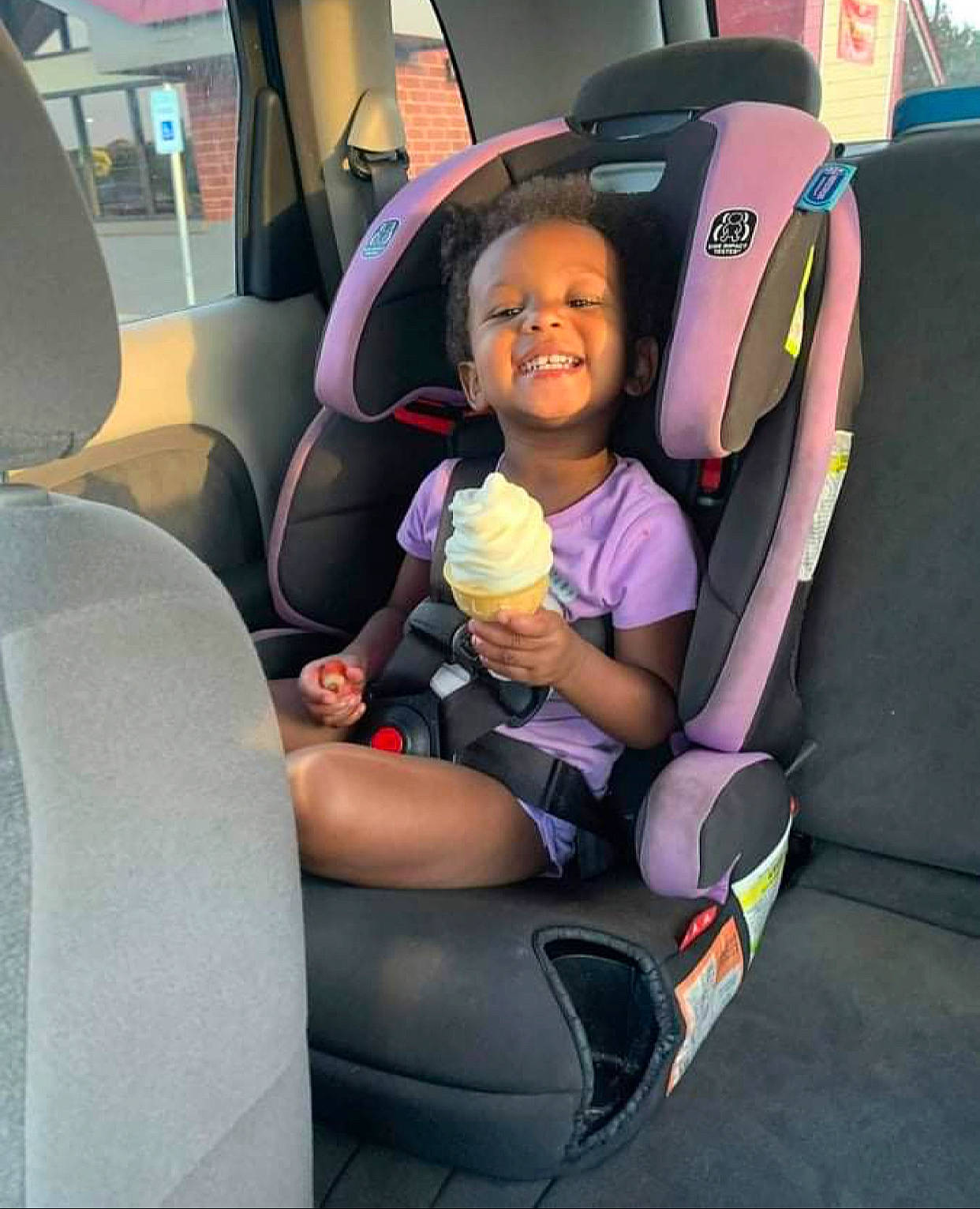 Carter is registered to the contest to win money with this photo: auto_part, automotive_design, automotive_exterior, baby_in_car_seat, car, car_seat, car_seat_cover, comfort, family_car, head_restraint, joy, leisure, luxury_vehicle, motor_vehicle, passenger, person, seat_belt, smile, toddler, travel