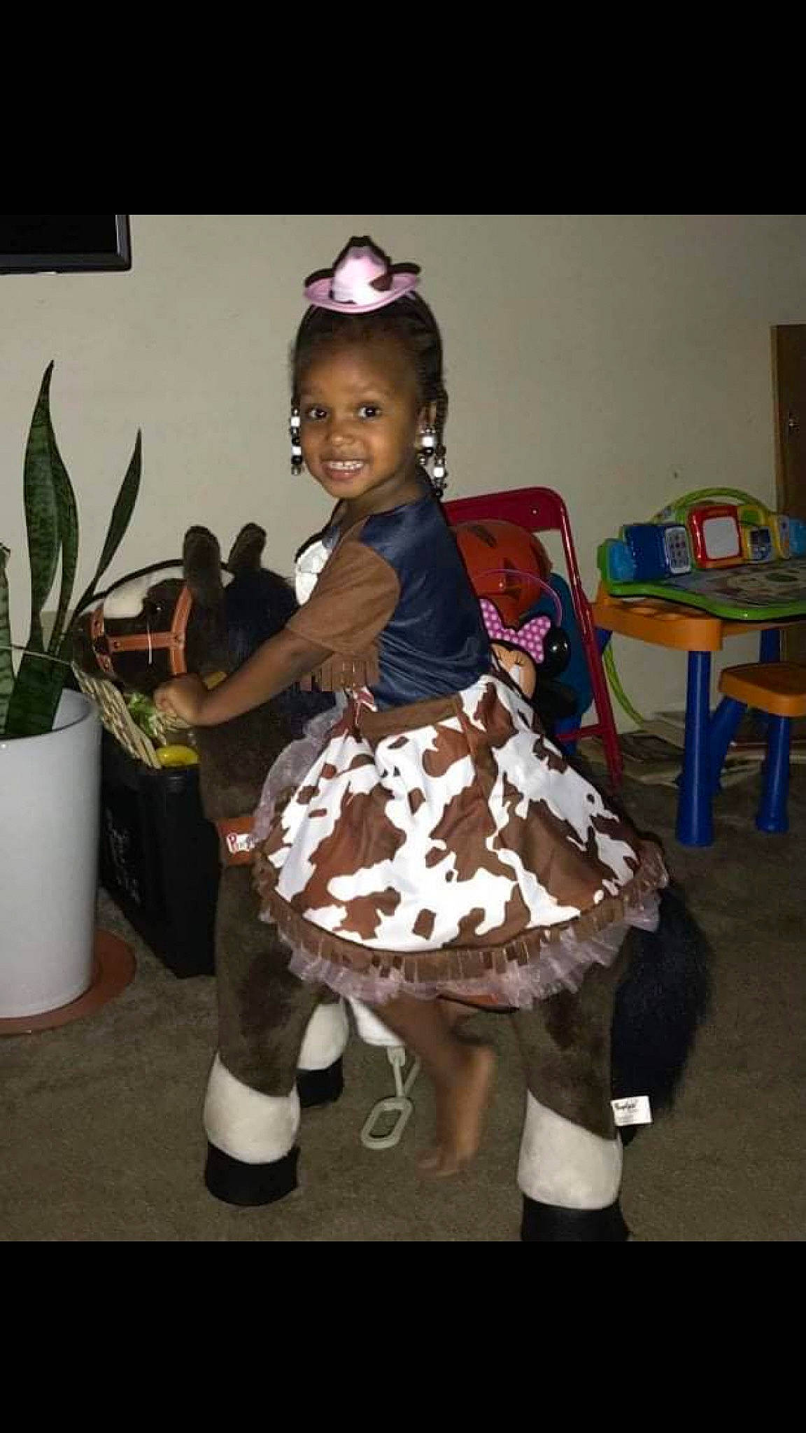 Carter joined the competition — help win amazing prizes! chair, child, costume, dance, event, fashion_accessory, fashion_design, flowerpot, fun, fur, happy, headpiece, houseplant, joy, party, person, plant, room, sandal, smile