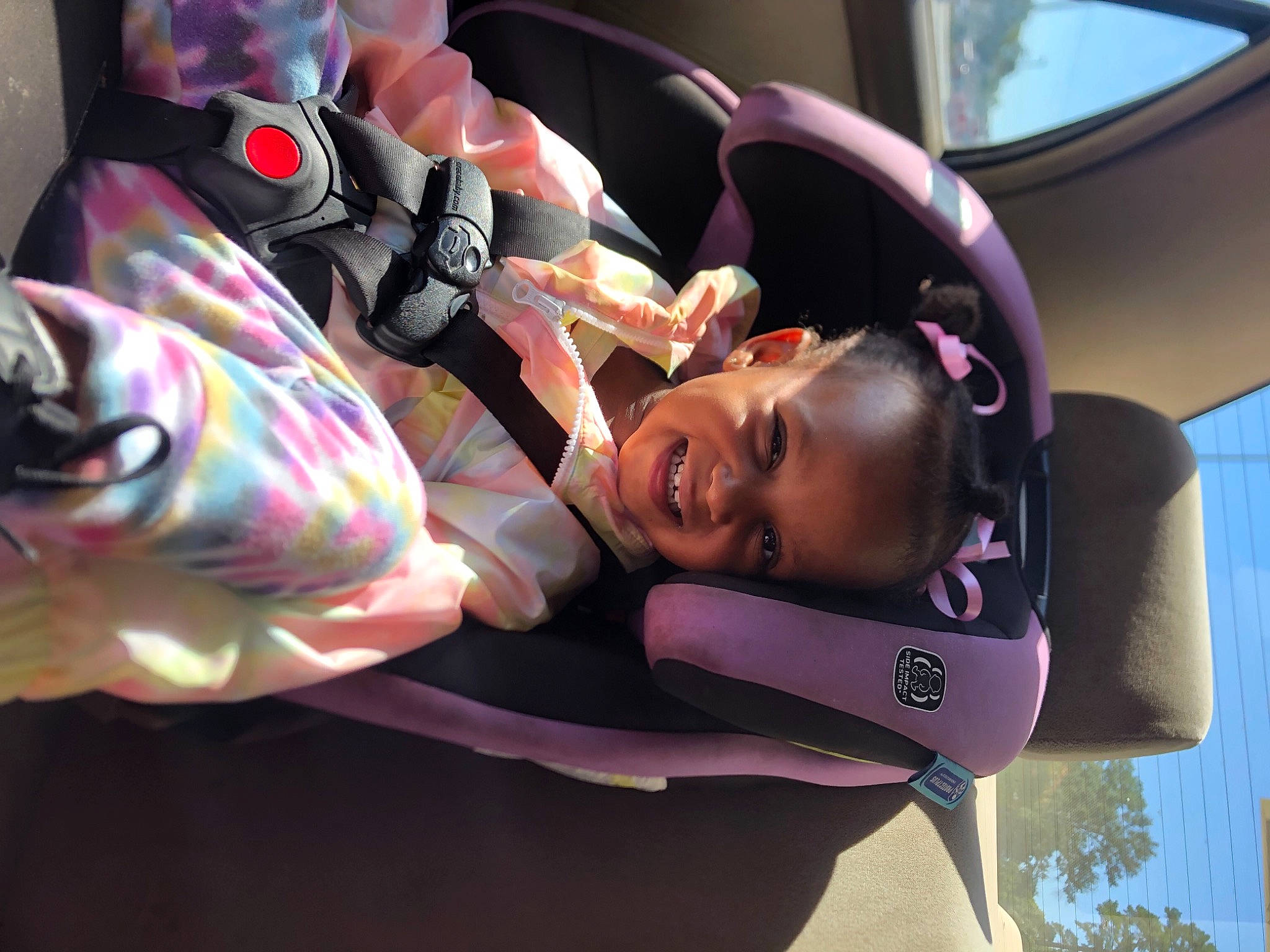 Carter joined the competition — help win amazing prizes! auto_part, automotive_design, automotive_exterior, automotive_wheel_system, car_seat, child, event, eyewear, fun, joy, leisure, luxury_vehicle, magenta, motor_vehicle, person, pink, purple, smile, steering_wheel, sunglasses