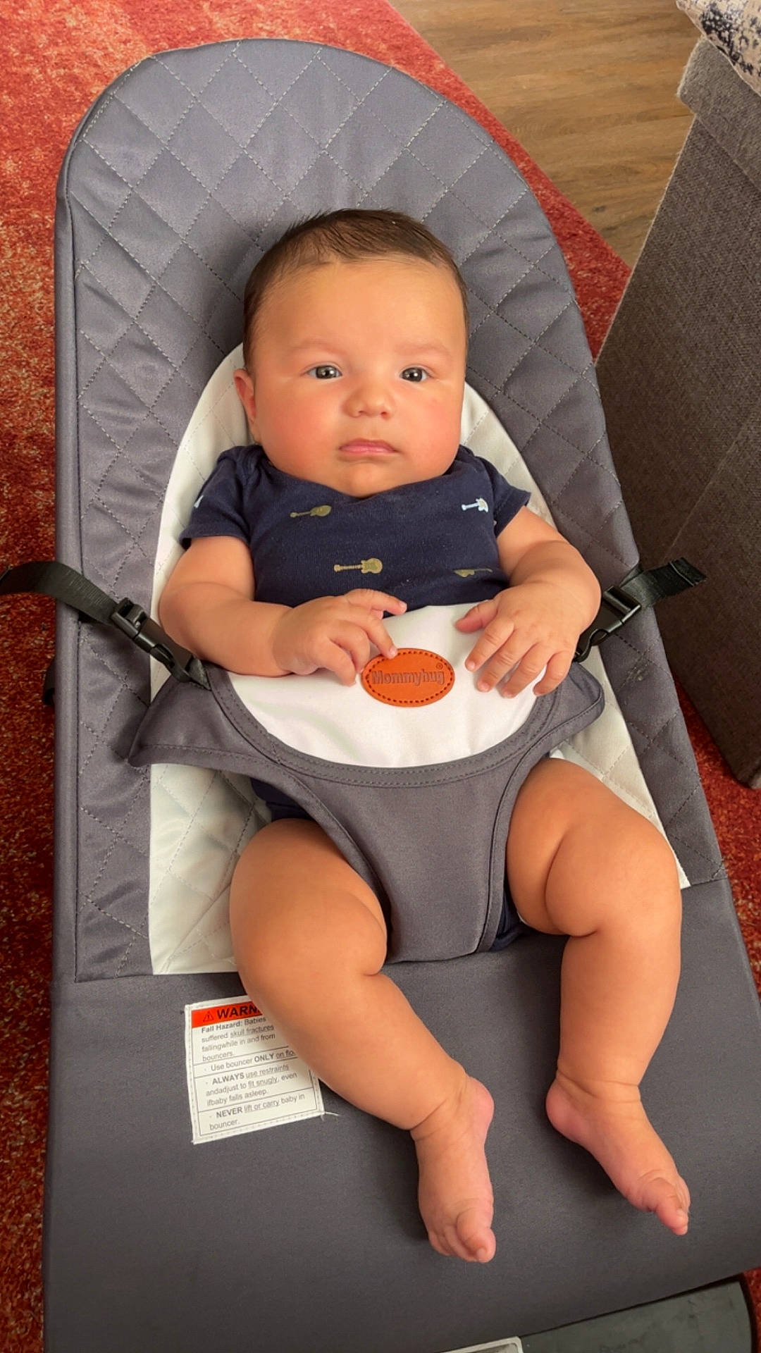 accessories, baby, bed, bodypart, crib, cushion, cutlery, face, finger, furniture, hand, head, homedecor, infantbed, newborn, person, photography, portrait, spoon, strap