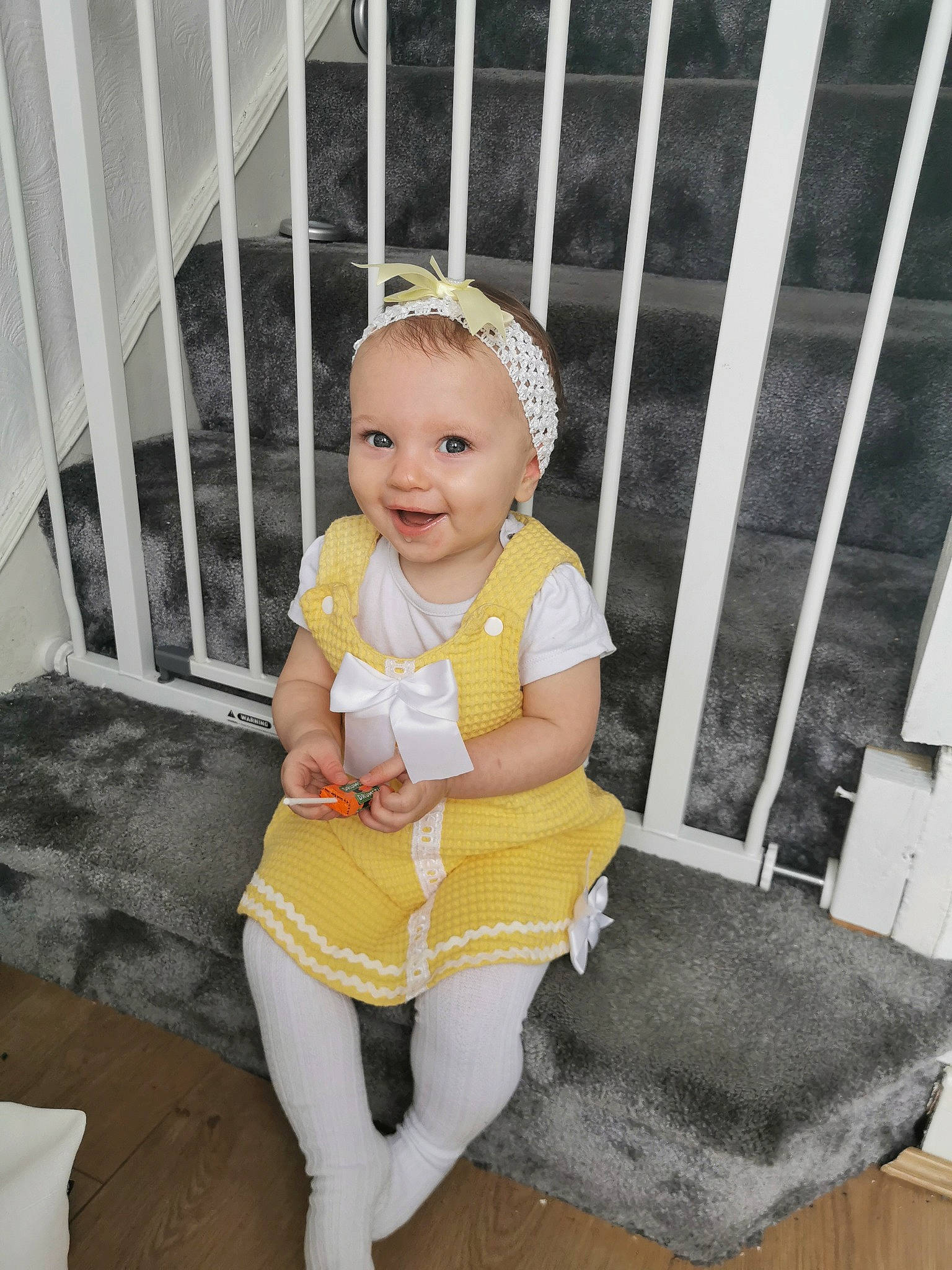 Maliah is registered to the contest to win money with this photo: baby_toddler_clothing, child, joy, person, smile, toddler, yellow