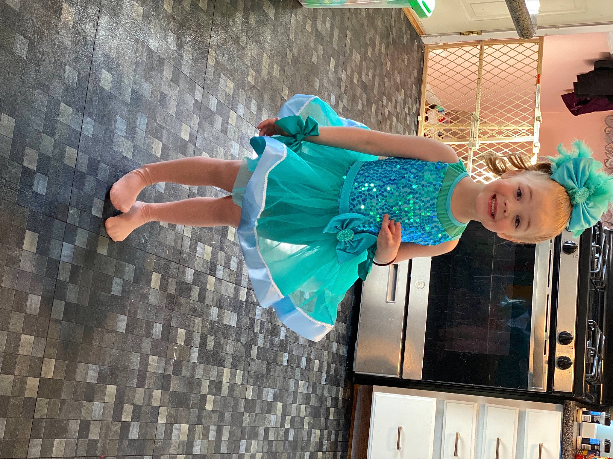 Madison is registered to the contest to win money with this photo: dress, electric_blue, entertainment, event, fashion_design, fun, happy, human_leg, joy, leisure, magenta, performance, performance_art, performing_arts, person, pink, public_event, purple, smile, street_fashion