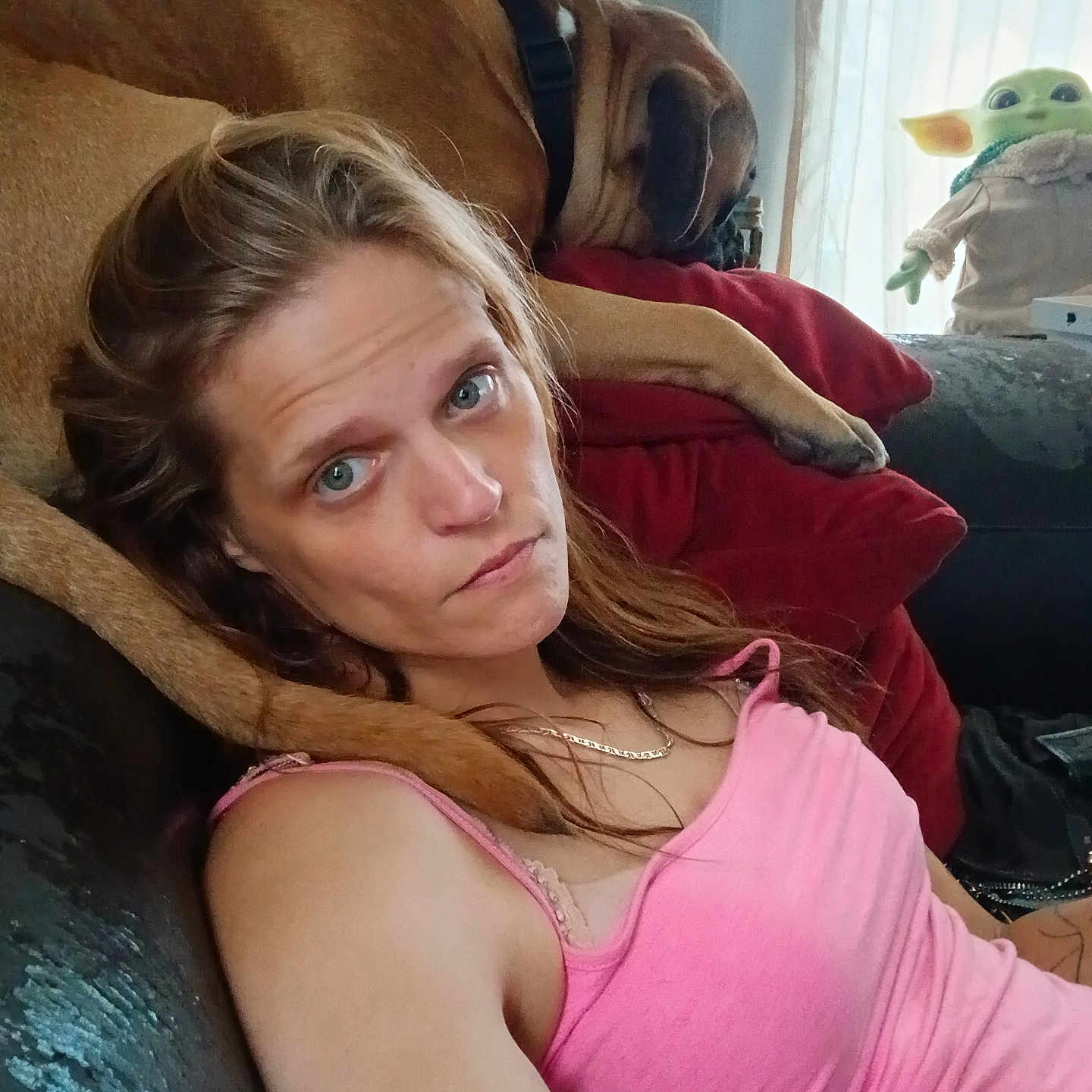 Buddy is registered to the contest to win money with this photo: adult, animal, bodypart, bulldog, canine, couch, cushion, dog, face, female, finger, furniture, hand, head, homedecor, person, pet, photography, portrait, woman