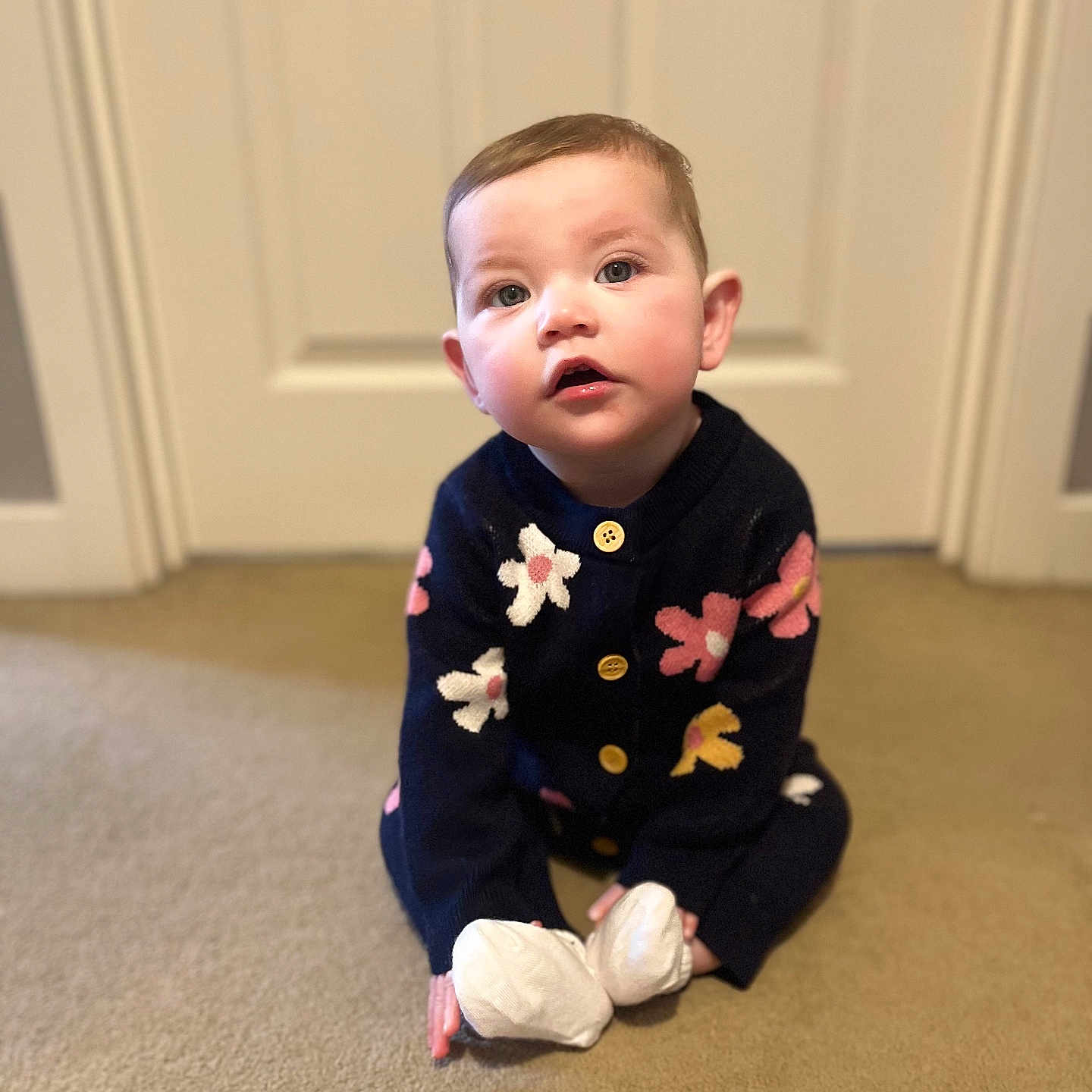 Cara-Grace joined the competition — help win amazing prizes! baby, clothing, crawling, door, dress, face, fashion, footwear, formalwear, hardwood, head, pants, person, photography, portrait, shoe, sitting, standing, suit, wood