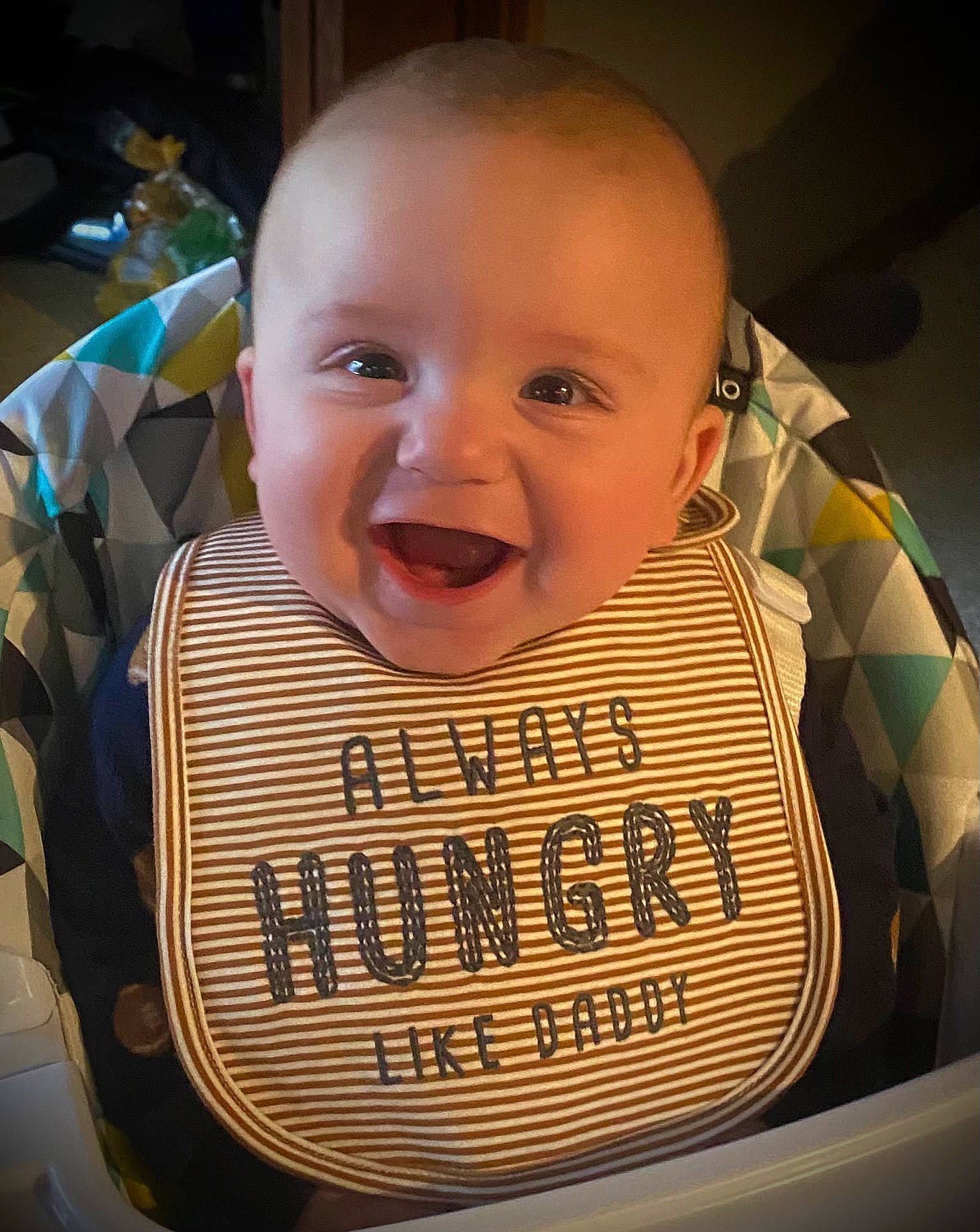 Weiland is registered to the contest to win money with this photo: baby, baby_toddler_clothing, bib, cheek, chin, comfort, cool, eye, facial_expression, finger, hairstyle, happy, head, iris, joy, mouth, person, product, skin, sleeve