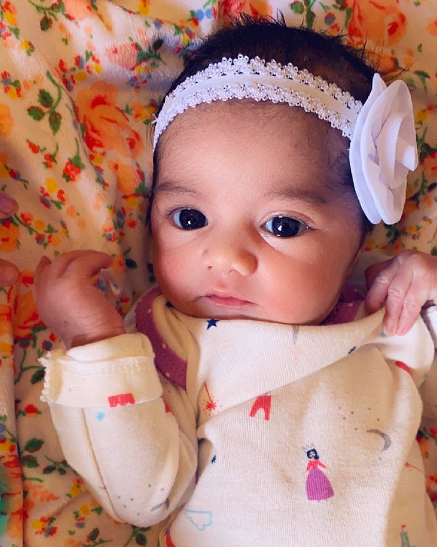 Salena joined the competition — help win amazing prizes! baby, baby_products, baby_toddler_clothing, bonnet, cheek, child, costume_accessory, hair_accessory, headband, headgear, headpiece, headwear, lip, peach, person, pink, skin, toddler