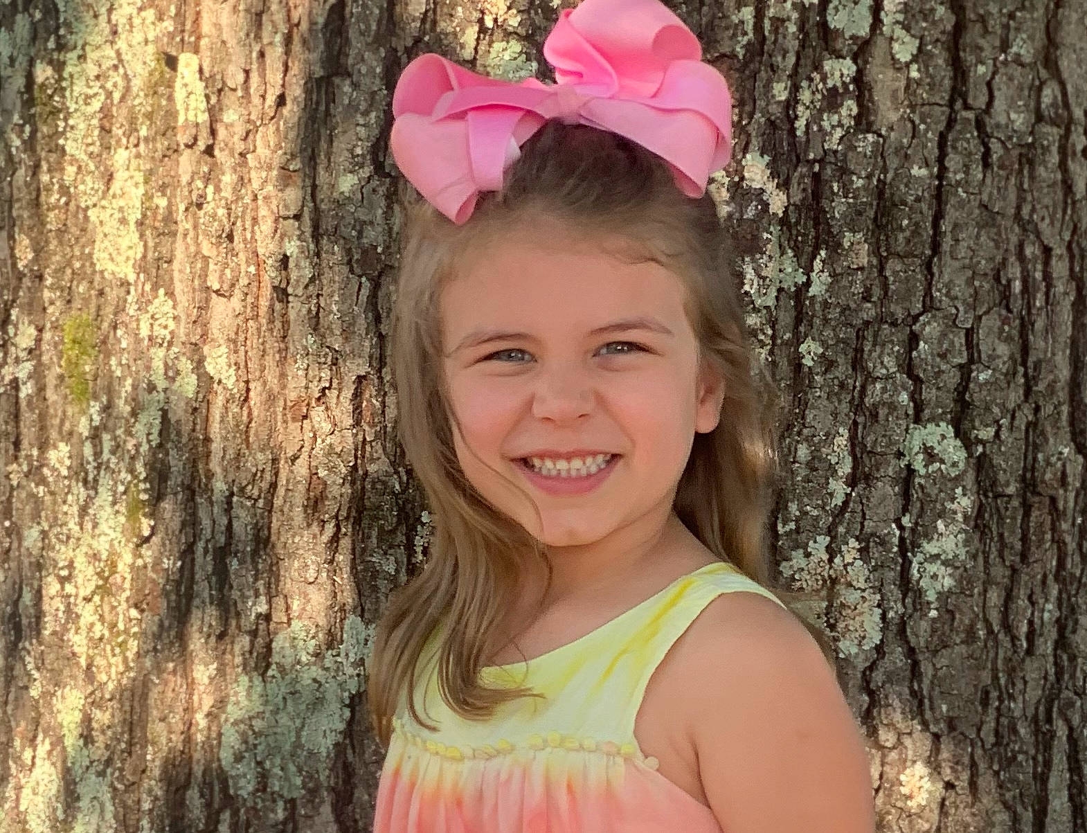 Kyndal joined the competition — help win amazing prizes! branch, clothing, eye, face, flash_photography, grass, happy, iris, joy, leaf, lip, organ, people_in_nature, person, pink, plant, skin, smile, summer, toddler