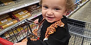 Stella Rose joined the competition — help win amazing prizes! baby, bodypart, candy, face, finger, food, grocerystore, hand, head, indoors, market, person, photography, portrait, shelf, shop, shopping, shoppingcart, supermarket, sweets
