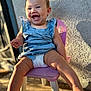 Natalieah is registered to the contest to win money with this photo: baby, child, smiling, laughing, blue_dress, diaper, pink_chair, sunlight, shadow, wall, outdoor, happy, cute, person, legs, skin, seat, infant, portrait, daylight