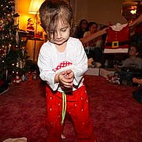 Elliana joined the competition — help win amazing prizes! baby, baby_toddler_clothing, child, christmas, christmas_decoration, christmas_tree, conifer, event, flooring, fun, happy, holiday, living_room, pattern, person, room, sitting, sleeve, t_shirt, toddler