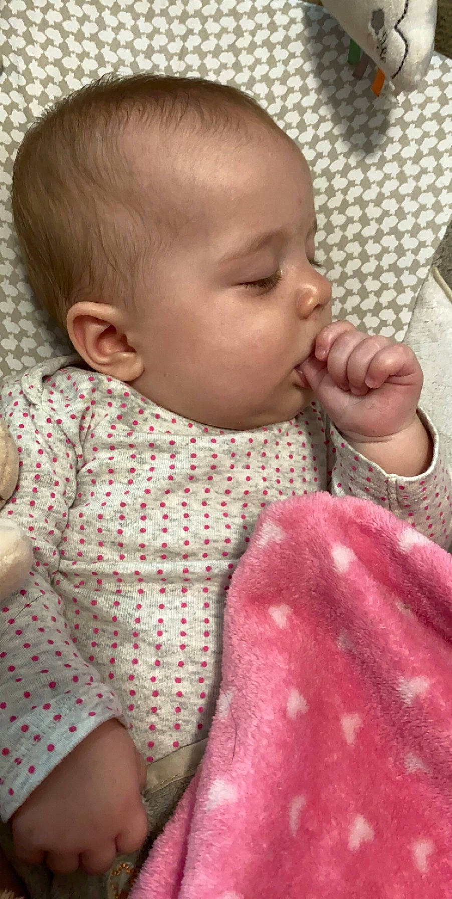 Mariah is registered to the contest to win money with this photo: baby, cheek, child, design, ear, eye, face, finger, forehead, hand, head, lip, mouth, neck, nose, pattern, person, pink, skin, toddler