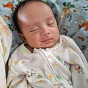 Jasper joined the competition — help win amazing prizes! baby, sleeping, onesie, blanket, animal_print, infant, peaceful, cute, face, head, child, soft, cozy, indoors, portrait, newborn, clothing, resting, smile, peace