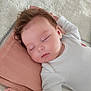 Jade a rejoint le concours — aidez-le/la à gagner de superbes lots ! baby, sleeping, infant, white_clothing, pillow, blanket, bed, soft_texture, peaceful, cute, child, indoor, rest, sleep, newborn, skin, face, hand, cozy, quiet
