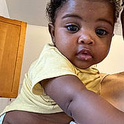 Ja Kai joined the competition — help win amazing prizes! baby, child, indoor, yellow_shirt, curious, close_up, arm, diaper, person, skin, expression, face, human, young, portrait, cute, infant, hand, eye, hair