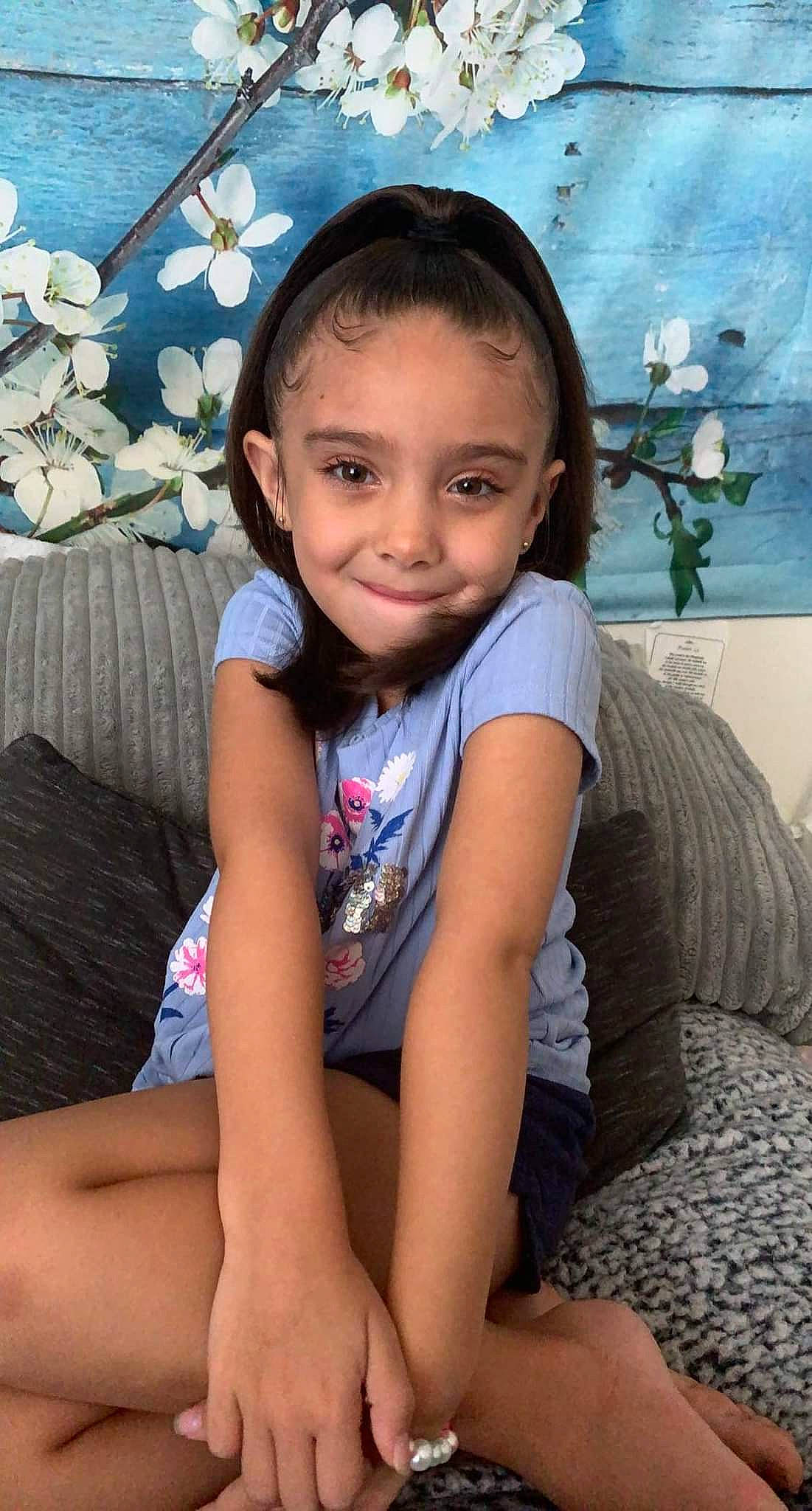 Aubrey Jean Friend is registered to the contest to win money with this photo: baby_toddler_clothing, black_hair, elbow, eye, flash_photography, hair, hairstyle, happy, head, human_body, iris, joy, knee, leg, leisure, neck, person, plant, skin, smile