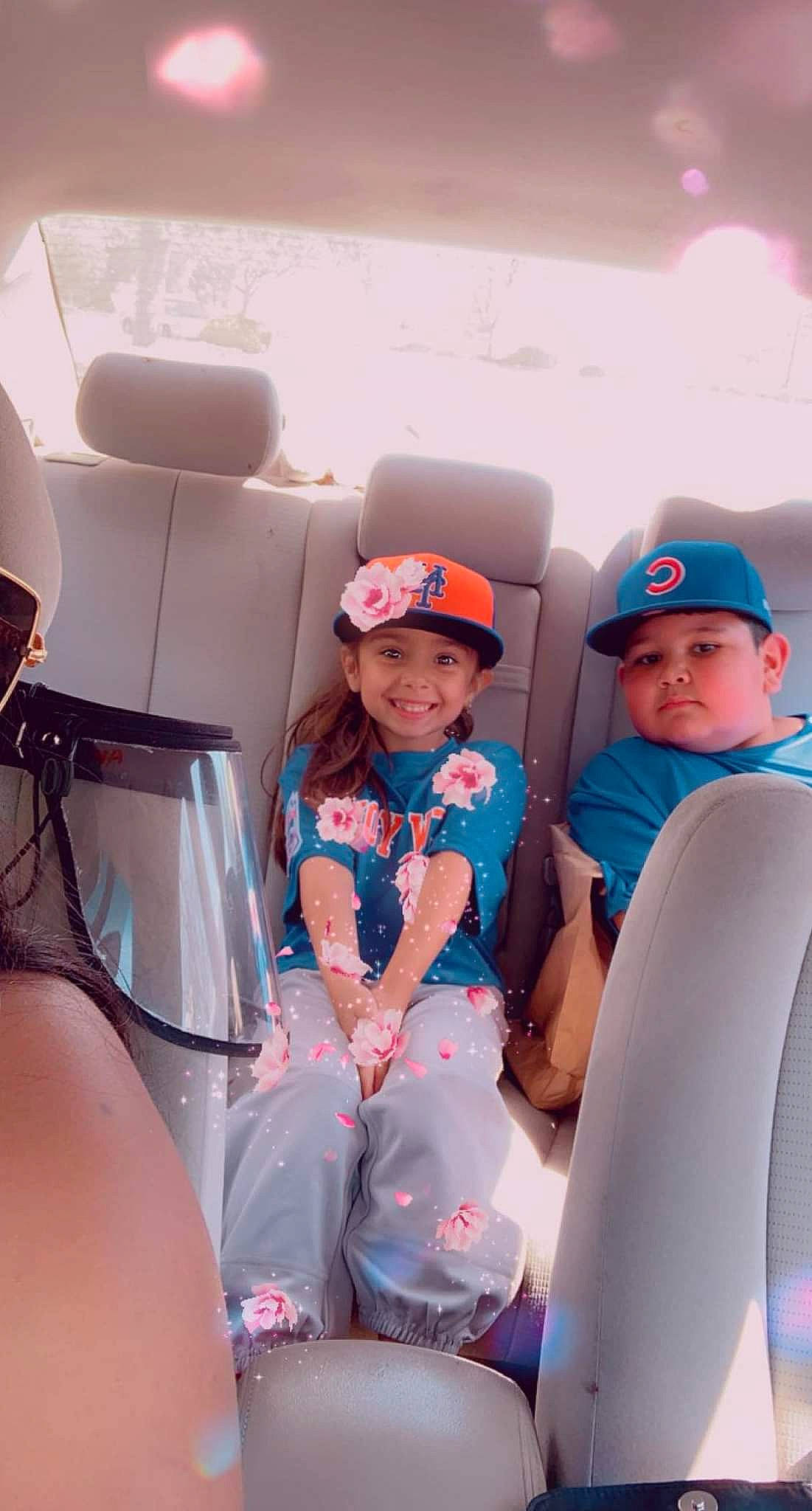 Aubrey Jean Friend is registered to the contest to win money with this photo: air_travel, automotive_design, baseball_cap, cap, electric_blue, event, fun, happy, hat, headwear, human_leg, joy, leisure, passenger, person, product, recreation, shorts, smile, t_shirt