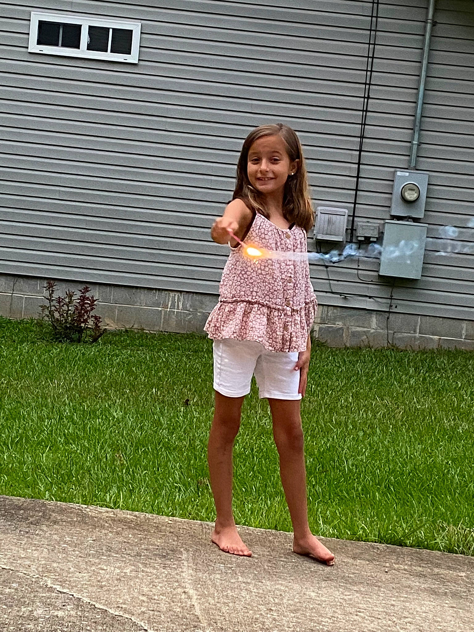 Madelynn is registered to the contest to win money with this photo: bangs, barefoot, blond, day_dress, denim, foot, grass, happy, human_leg, joy, knee, leg, leisure, magenta, pattern, person, plant, sleeve, smile, thigh