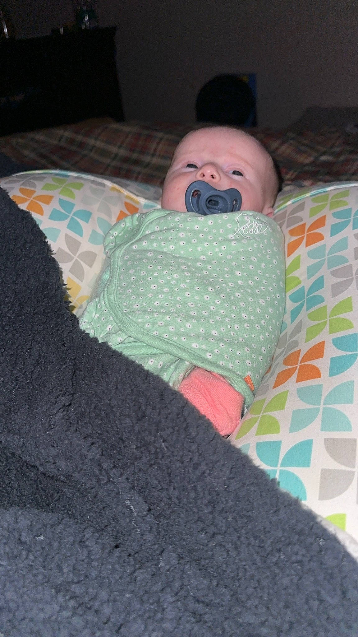 Brynlee is registered to the contest to win money with this photo: baby, baby_toddler_clothing, bedding, bedtime, blanket, child, comfort, flooring, goggles, linens, nap, pattern, person, room, sitting, sleep, textile, toddler, wood, woolen