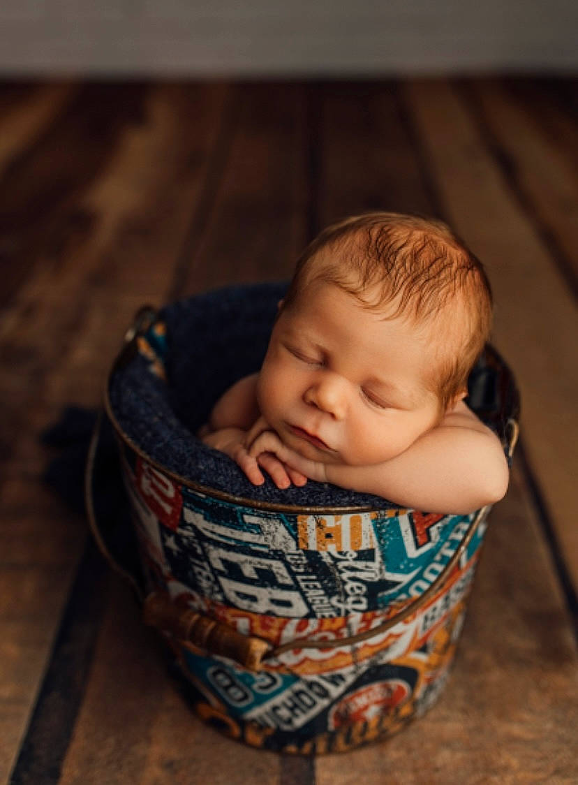Braxtyn joined the competition — help win amazing prizes! baby, baby_products, baby_toddler_clothing, bib, cheek, child, comfort, cup, drinkware, eye, fun, happy, hardwood, iris, lip, person, portrait_photography, serveware, sitting, toddler