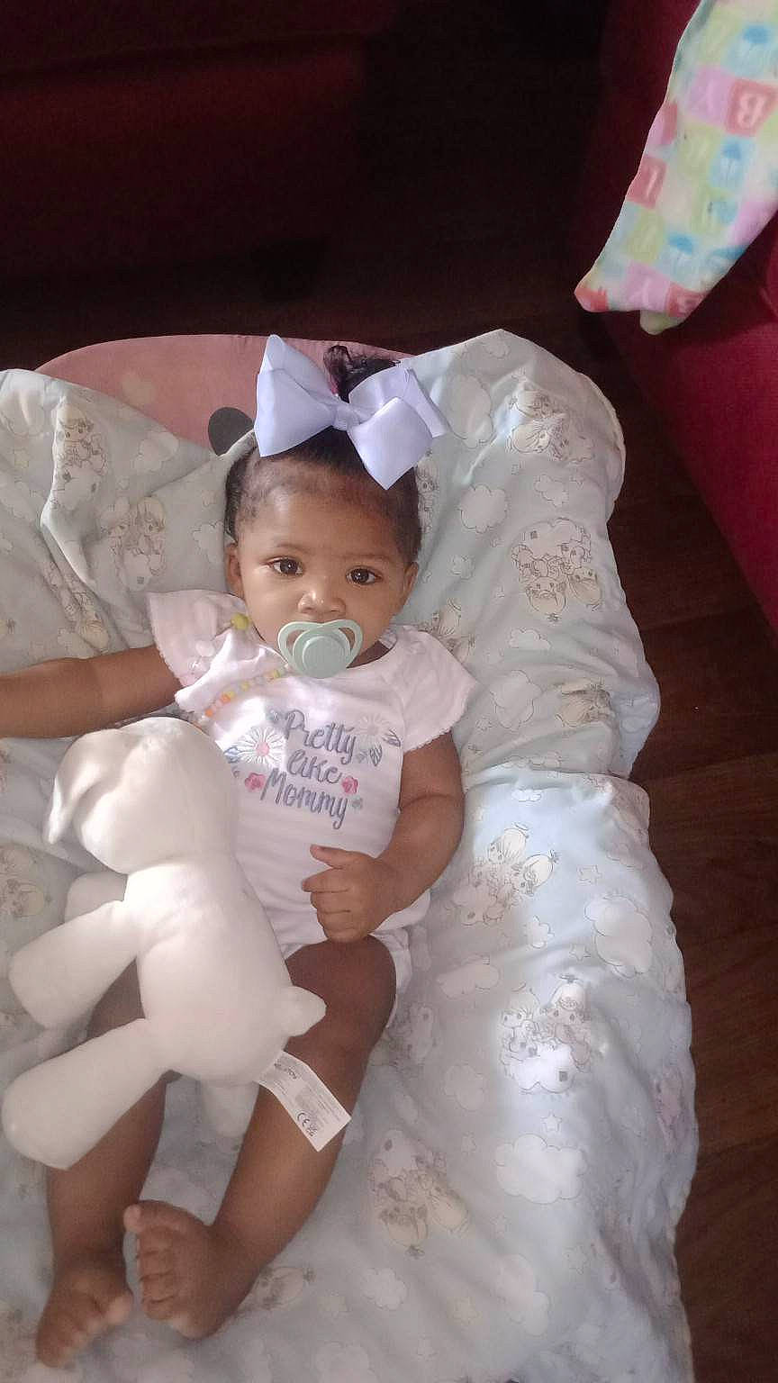 Cemaryah joined the competition — help win amazing prizes! baby, baby_toddler_clothing, cheek, child, comfort, dress, embellishment, event, facial_expression, happy, hat, head, human_body, iris, person, pink, sitting, skin, sleeve, textile