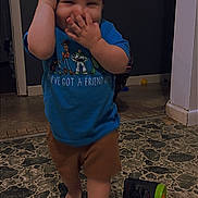 Braxton joined the competition — help win amazing prizes! toddler, child, blue_tshirt, toy_story, cap, barefoot, floor, sippy_cup, indoor, playful, walking, hand_on_face, smiling, shorts, person, young_child, home, tile_floor, cup, casual_clothing