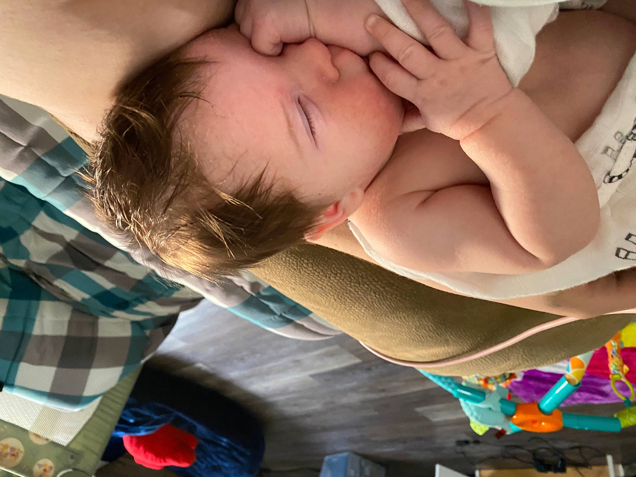 Scarlett is registered to the contest to win money with this photo: baby, beauty, child, comfort, eyelash, finger, gesture, hand, happy, human, mammal, mouth, pattern, people, person, photograph, plaid, skin, snapshot, tartan