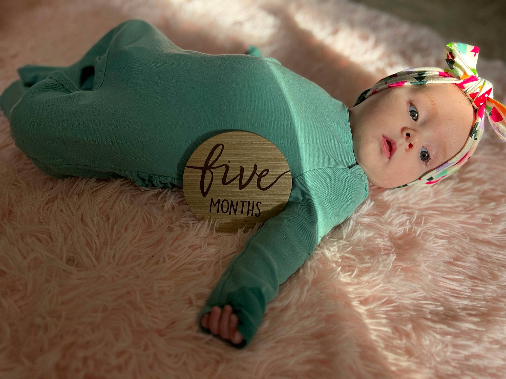 Lyla is registered to the contest to win money with this photo: baby, baby_products, baby_toddler_clothing, baby_toys, child, costume_hat, doll, fictional_character, fun, fur, happy, head, headgear, leisure, person, personal_protective_equipment, pink, sleeve, textile, toddler