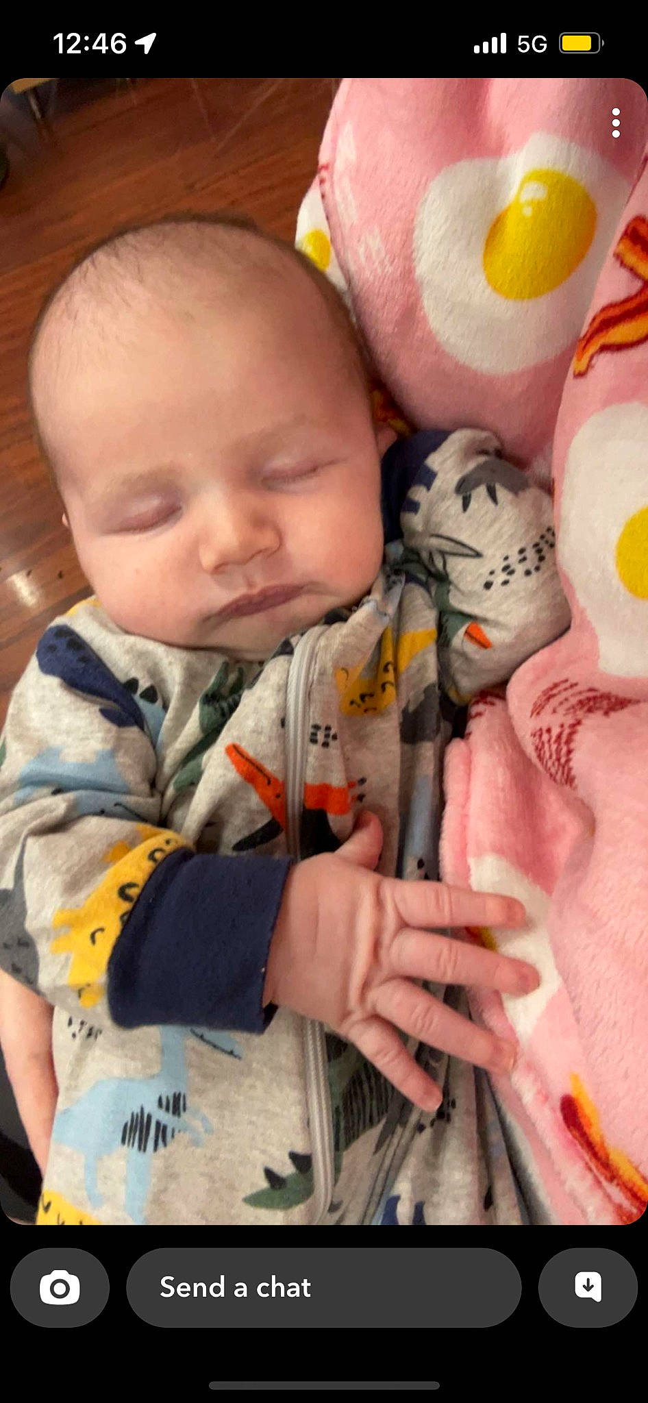 Logan is registered to the contest to win money with this photo: baby, baby_products, baby_toddler_clothing, cheek, child, comfort, eye, finger, fun, happy, head, iris, mouth, nose, person, play, skin, sleeve, textile, toddler